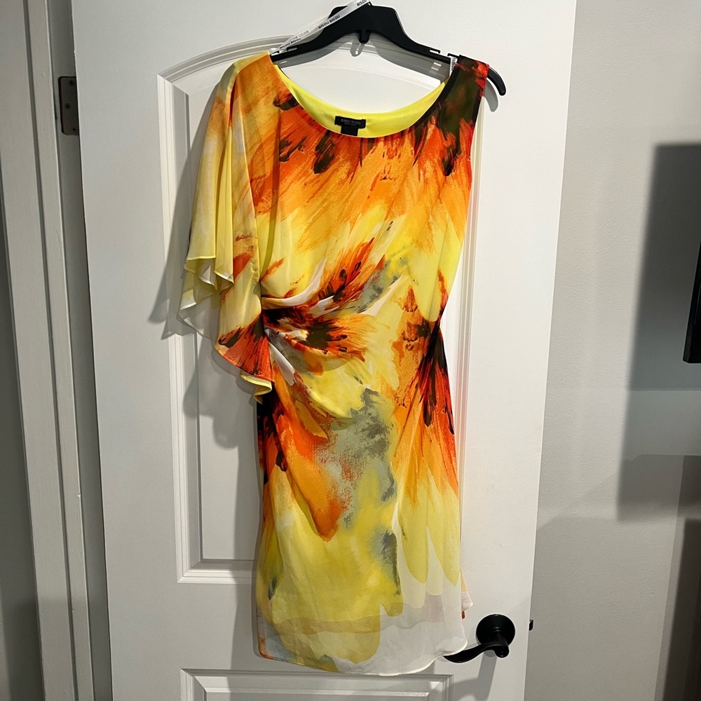Summer dress. Bright yellow, blood orange design.